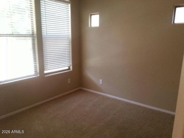 1939 East Emily Lane Gilbert, AZ 85295 - Photo 5 of 9 an empty room with a window
