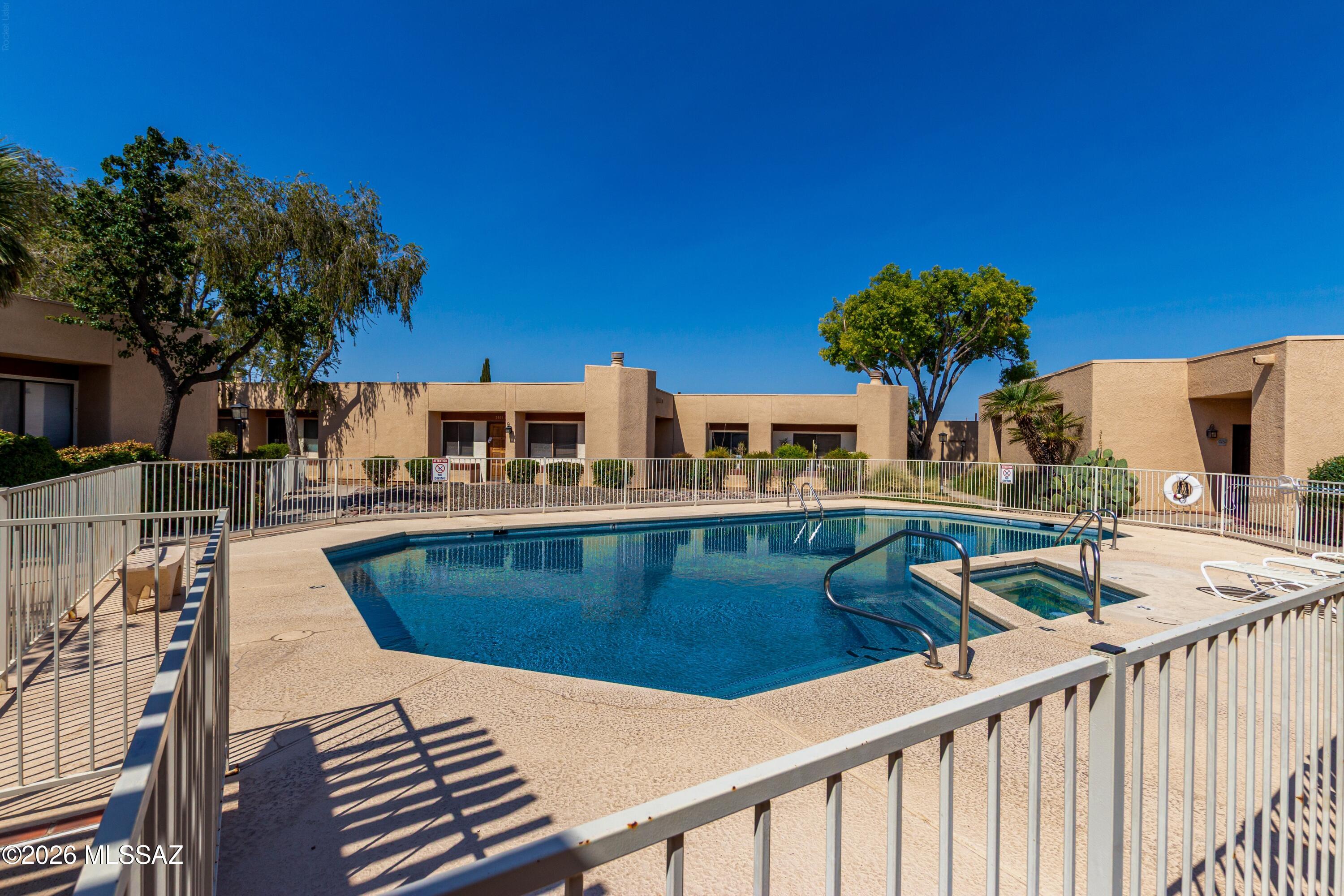 3781 East Edison Street Tucson, AZ 85716 - Photo 27 of 28 a view of a house with pool and chairs