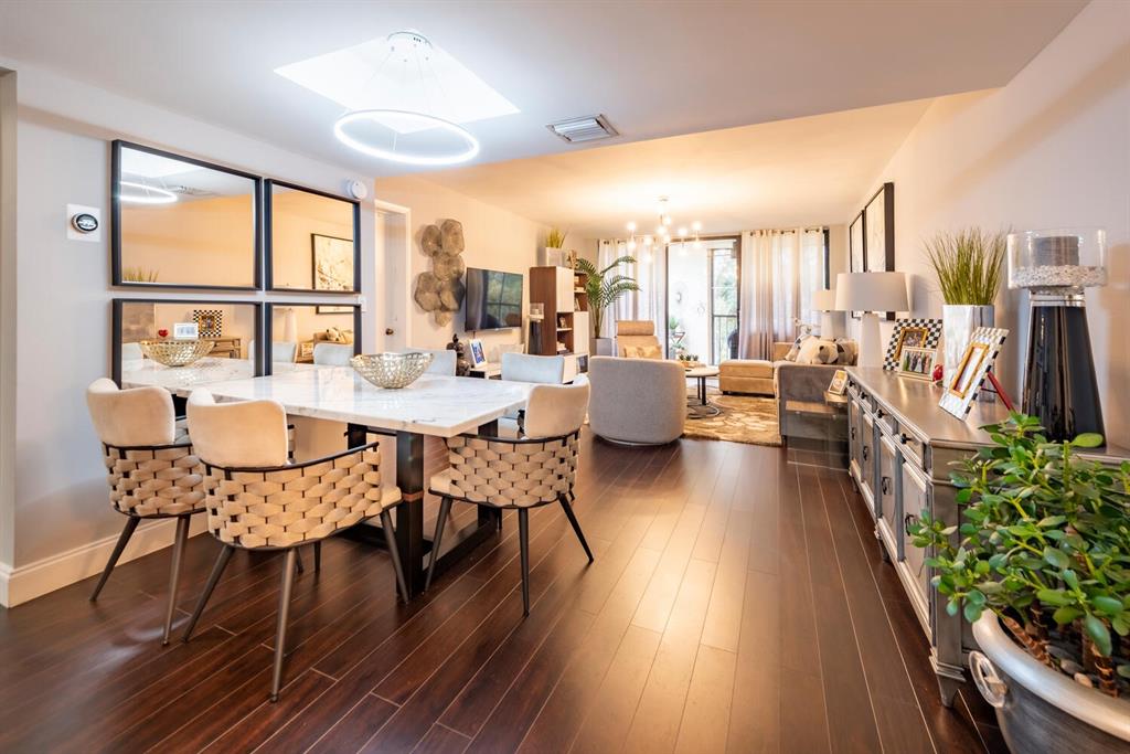 16251 Golf Club Road, Unit 305 Weston, FL 33326 - Photo 14 of 43 a view of a dining room with furniture window and wooden floor
