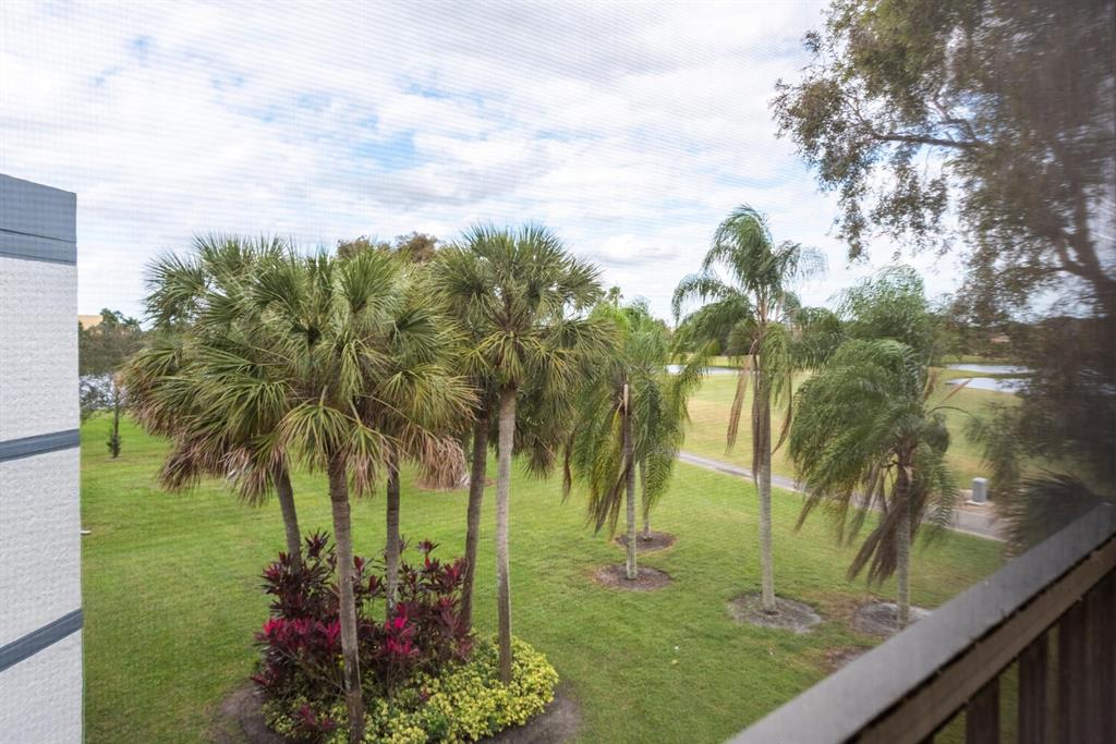 16251 Golf Club Road, Unit 305 Weston, FL 33326 - Photo 22 of 43 a view of a backyard