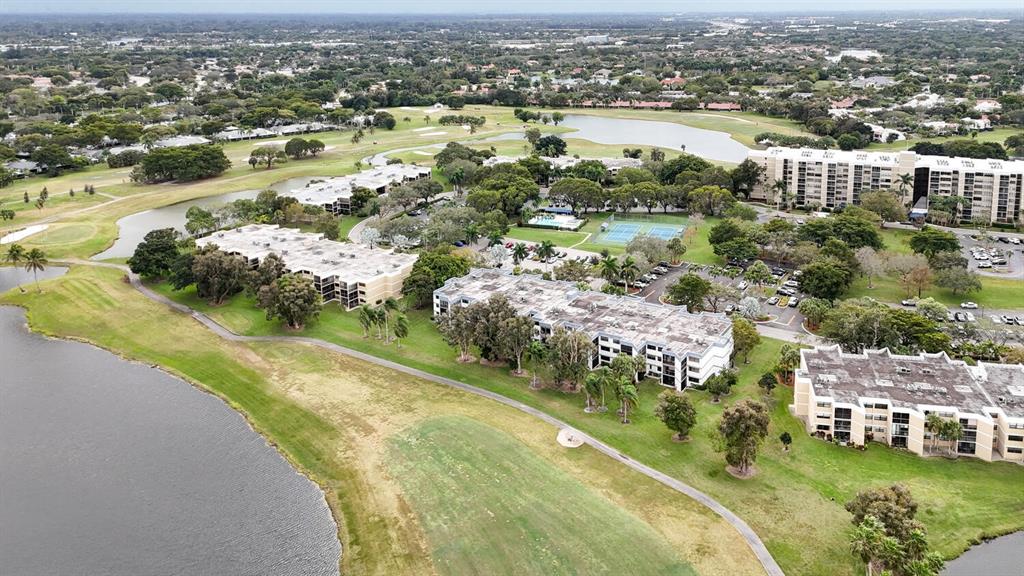 16251 Golf Club Road, Unit 305 Weston, FL 33326 - Photo 35 of 43 an aerial view of lake residential houses with outdoor space