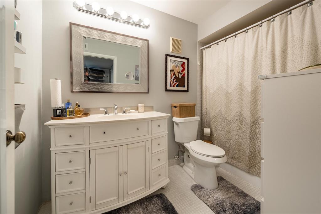 16251 Golf Club Road, Unit 305 Weston, FL 33326 - Photo 8 of 43 a bathroom with a sink toilet and mirror