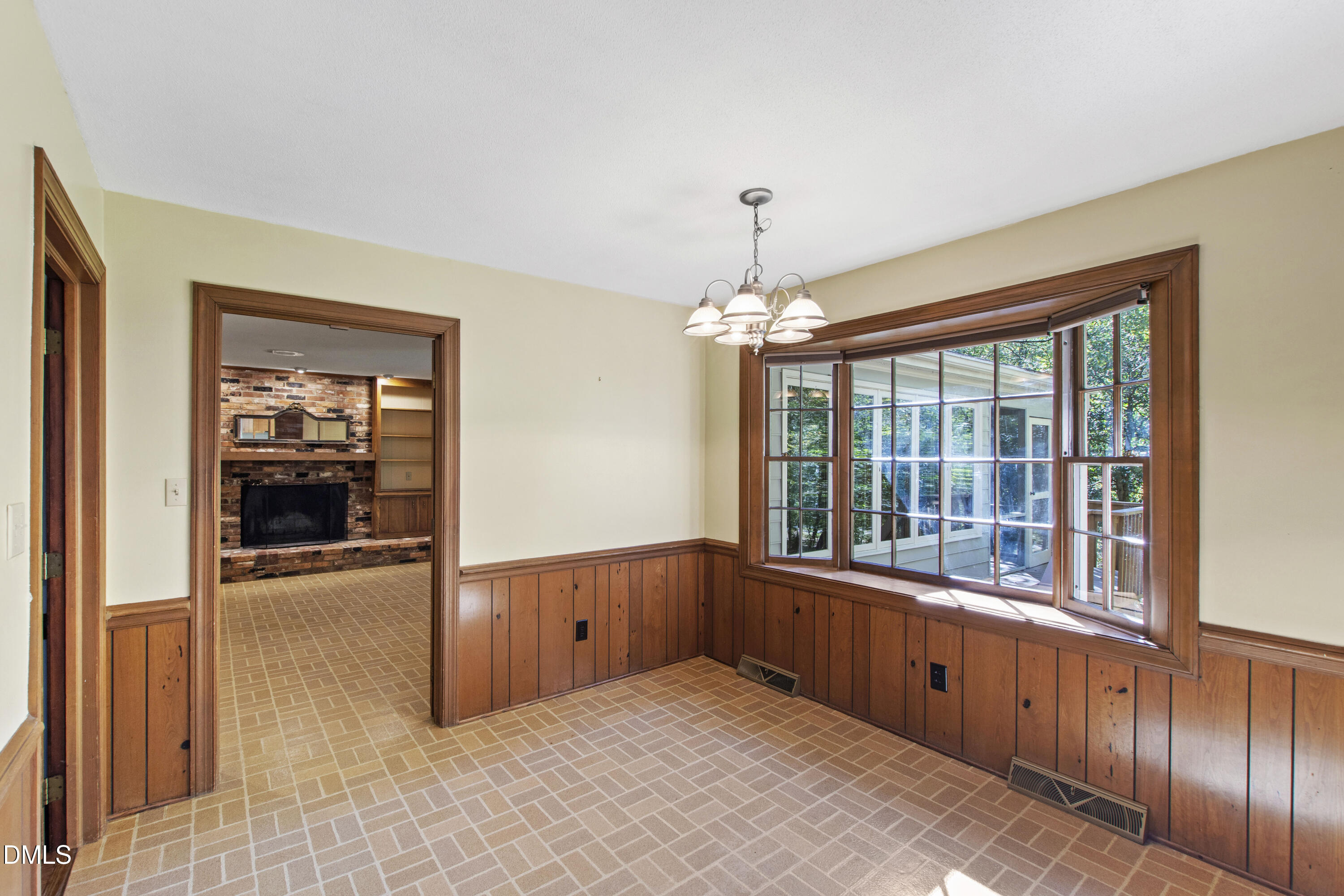 4208 Oak Park Road Raleigh, NC 27612 - Photo 13 of 66 a room with furniture and a large window