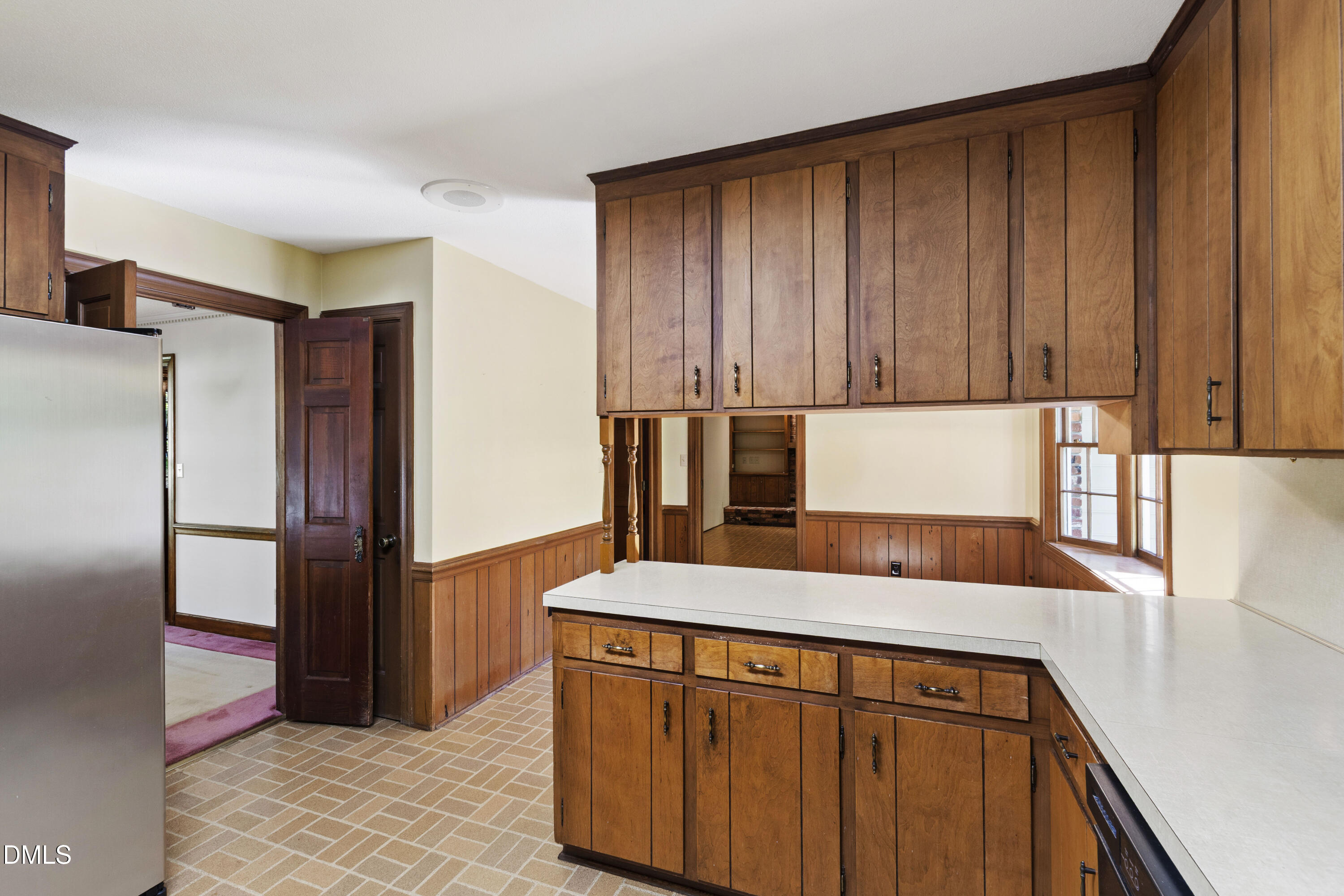 4208 Oak Park Road Raleigh, NC 27612 - Photo 19 of 66 a kitchen with stainless steel appliances granite countertop a refrigerator and a stove