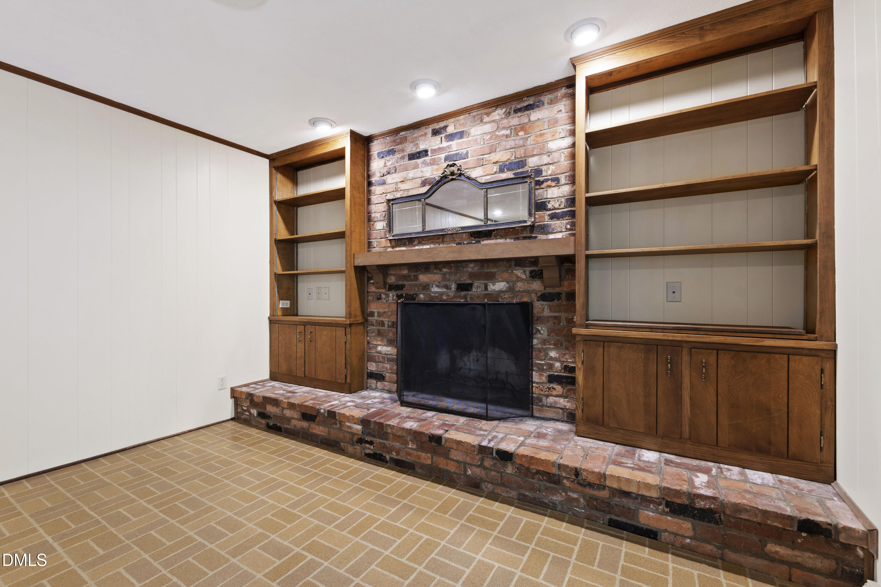 4208 Oak Park Road Raleigh, NC 27612 - Photo 21 of 66 a living room with a fireplace