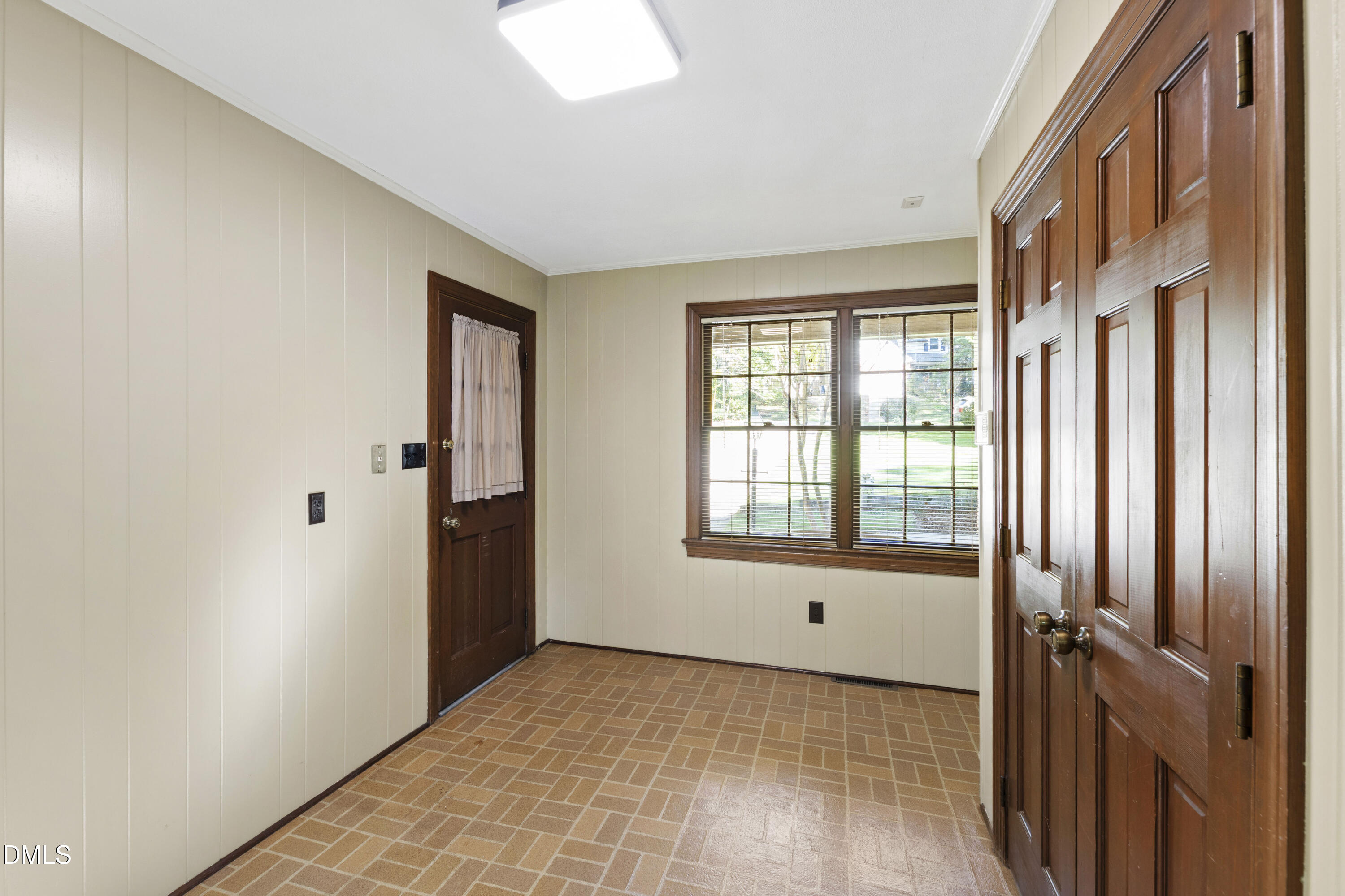 4208 Oak Park Road Raleigh, NC 27612 - Photo 29 of 66 a view of an empty room with a window