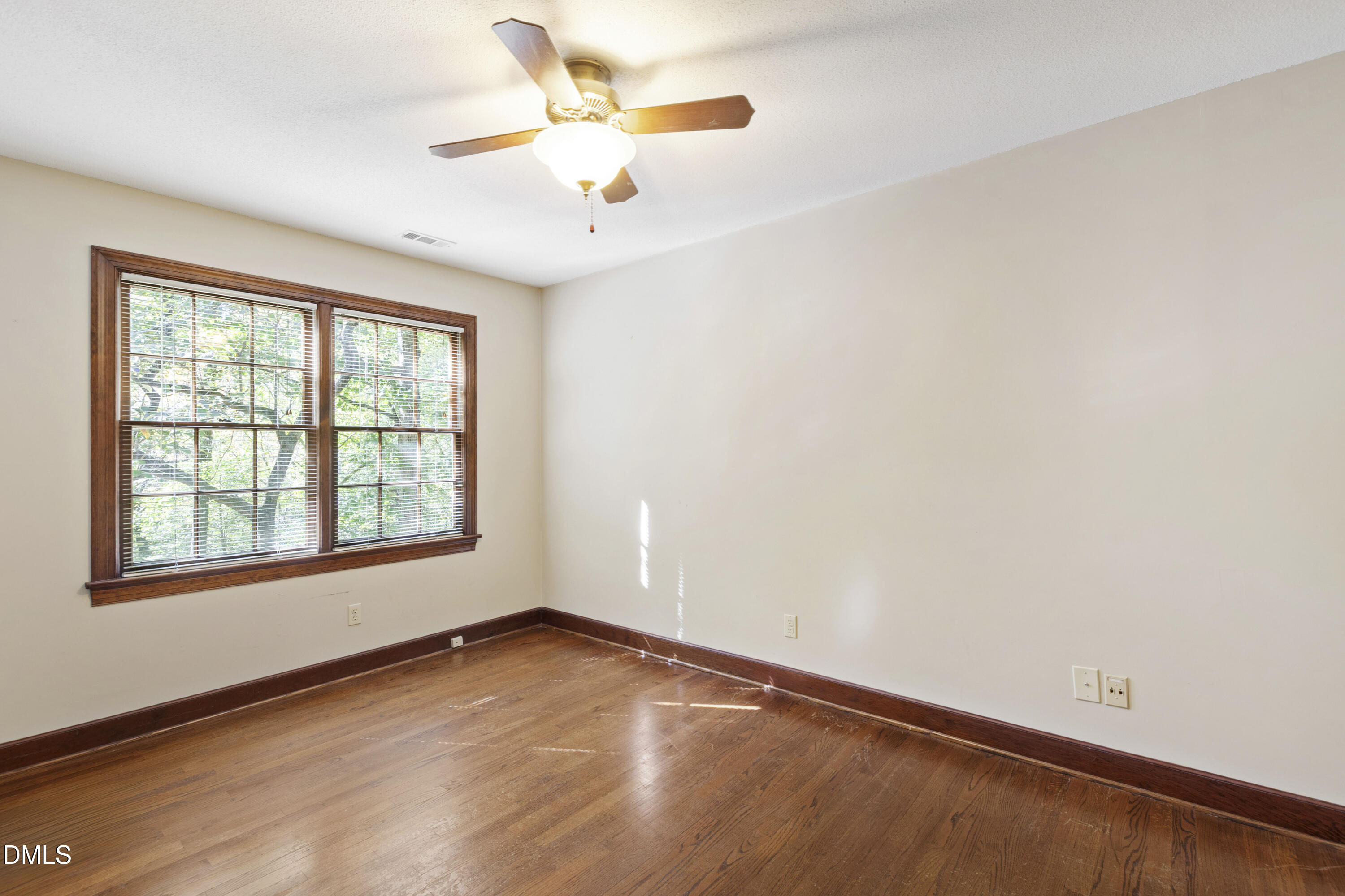 4208 Oak Park Road Raleigh, NC 27612 - Photo 46 of 66 an empty room with a window