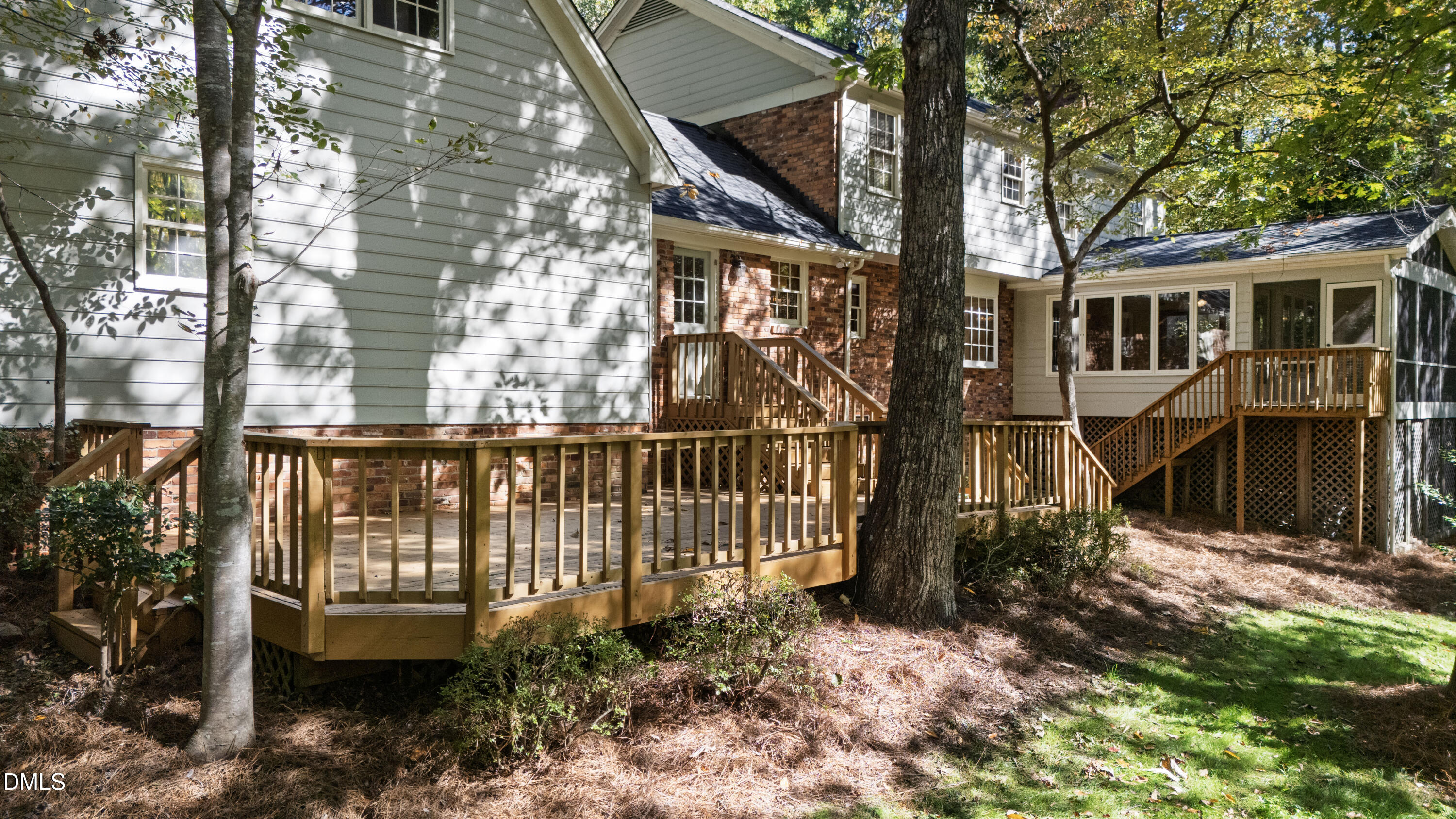 4208 Oak Park Road Raleigh, NC 27612 - Photo 51 of 66 a view of a house with backyard and porch