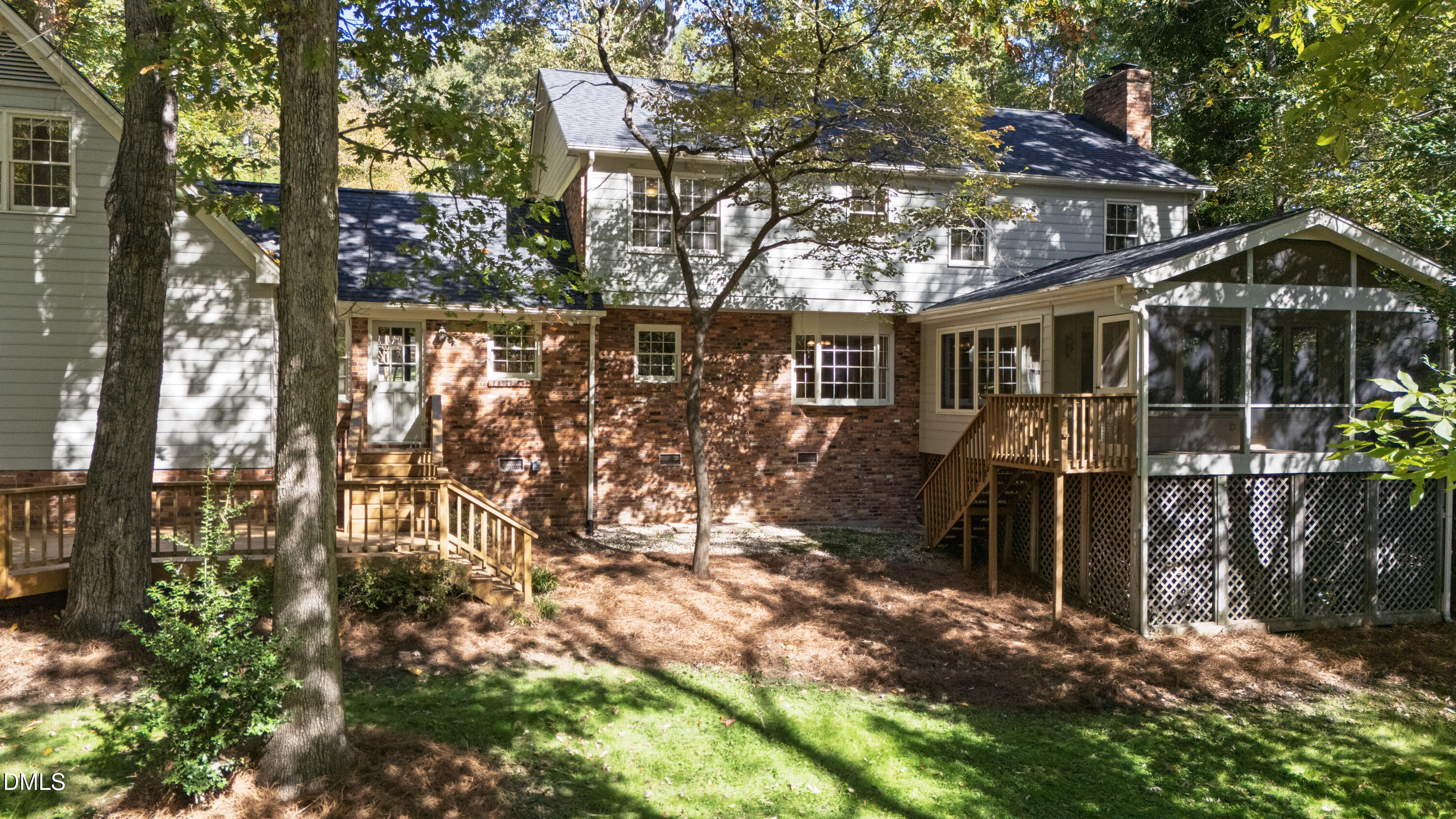 4208 Oak Park Road Raleigh, NC 27612 - Photo 58 of 66 a view of house with trees in the background