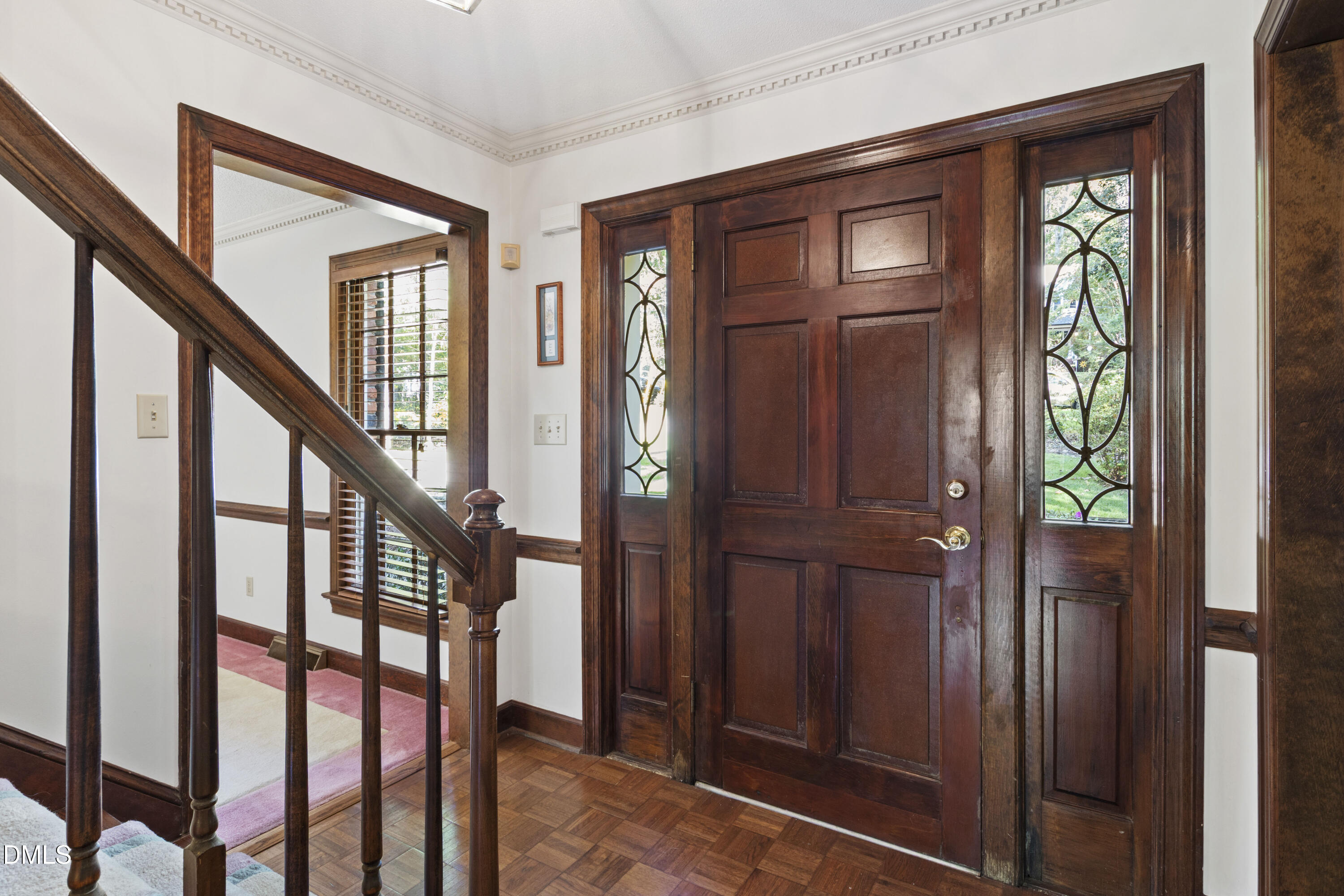 4208 Oak Park Road Raleigh, NC 27612 - Photo 6 of 66 a view of an entryway with wooden floor and stairs