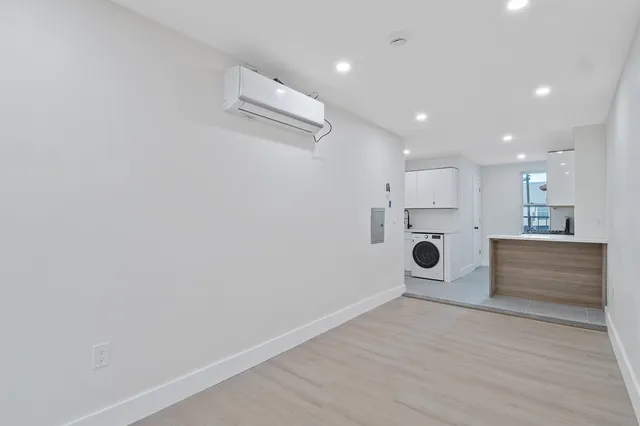 a view of kitchen with wooden floor