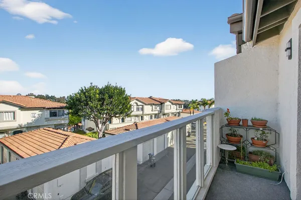 a view of a balcony with an outdoor space