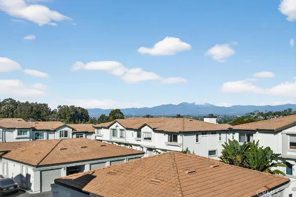 a view of a house with a ocean view