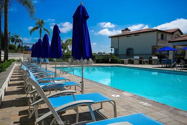 a view of a chairs and table on the patio