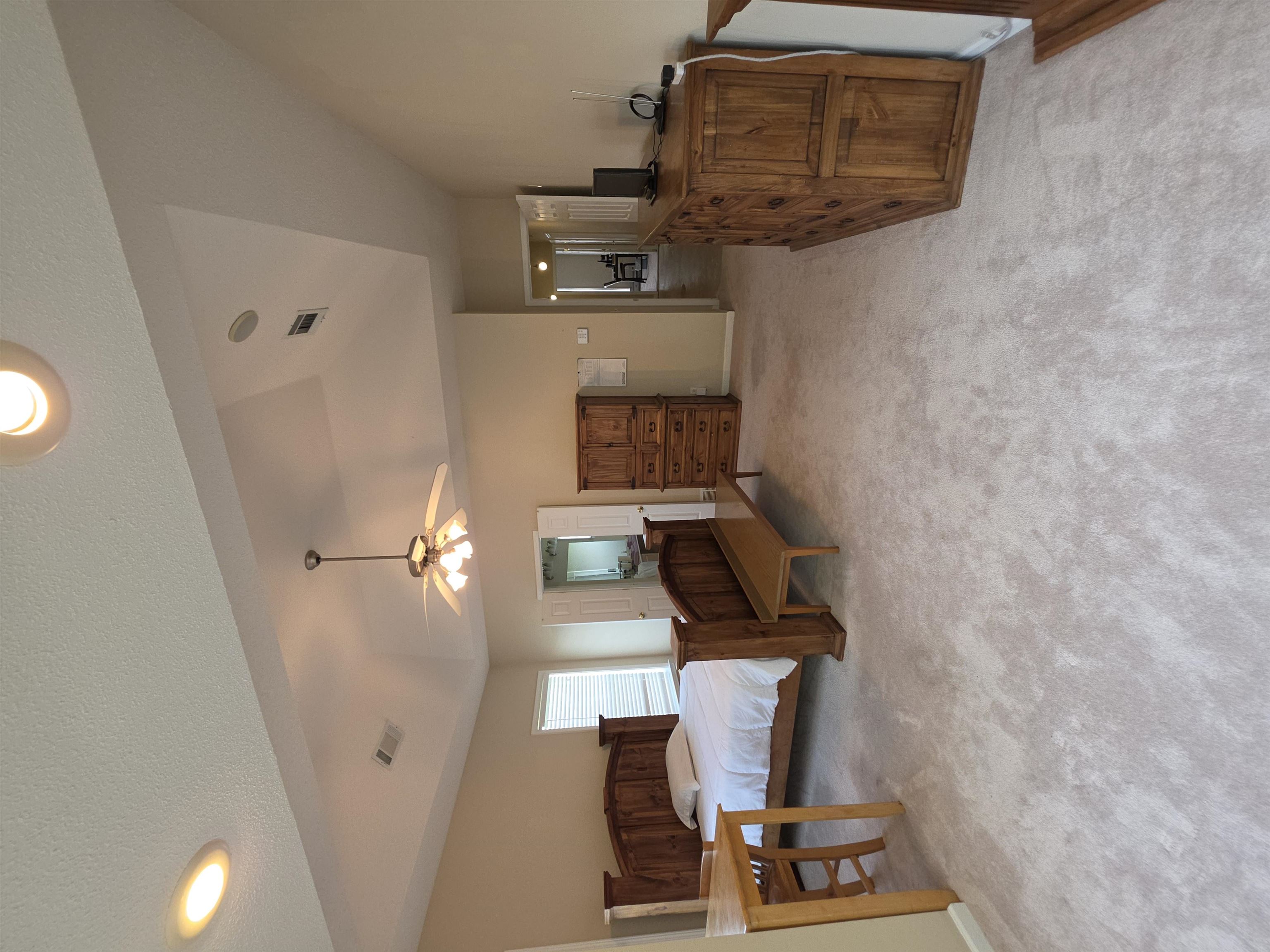 7253 Rourke Circle Memphis, TN 38125 - Photo 17 of 31 Vaulted ceiling with recessed lighting and a ceiling fan