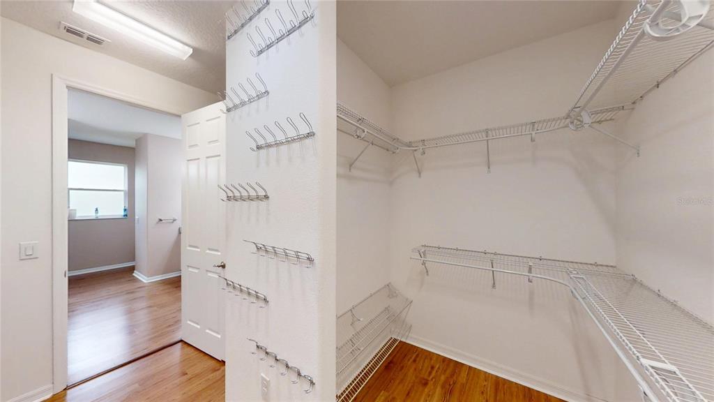 9273 Southwest 91st Ct Road Ocala, FL 34481 - Photo 27 of 38 a view of walk in closet