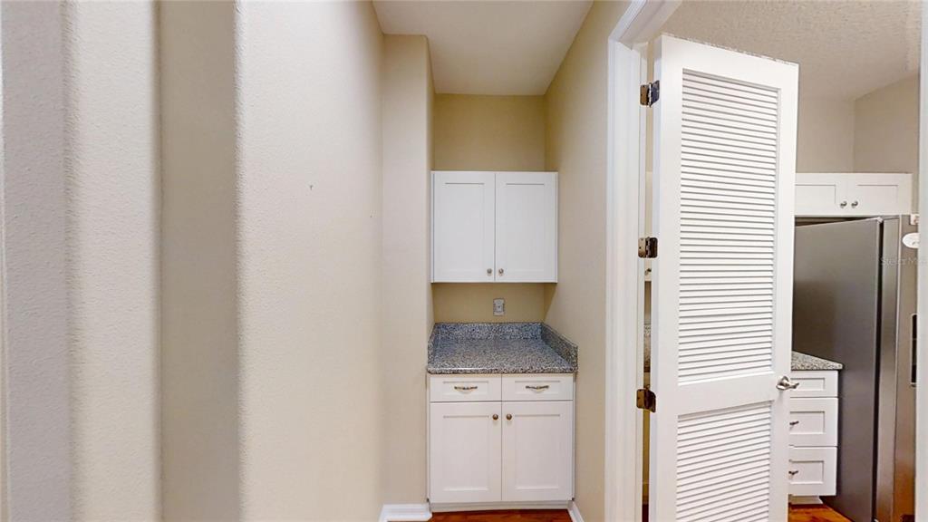 9273 Southwest 91st Ct Road Ocala, FL 34481 - Photo 31 of 38 a bathroom with a granite countertop sink and a window