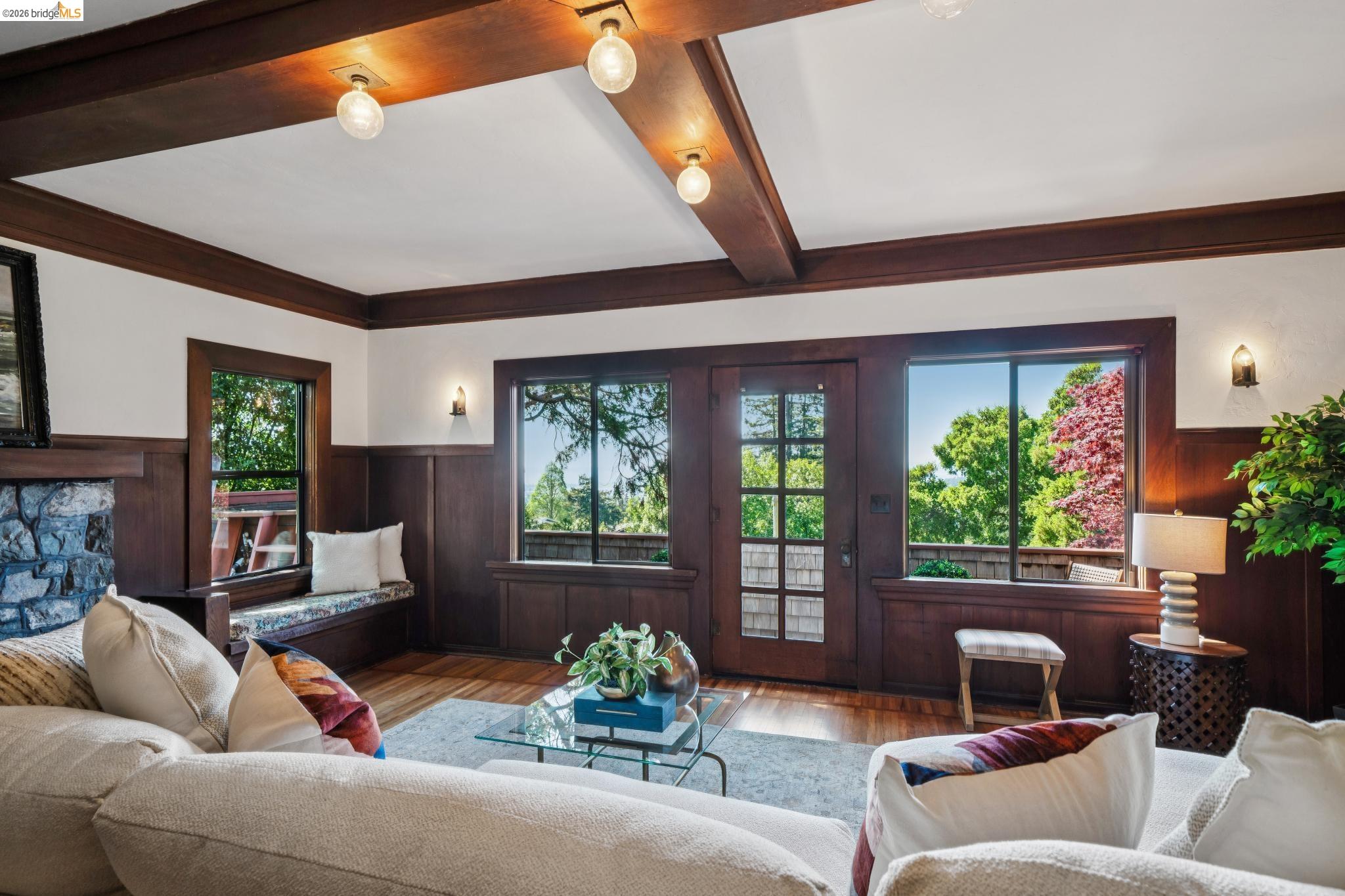 813 San Diego Road Berkeley, CA 94707 - Photo 6 of 60 a living room with furniture and a large window