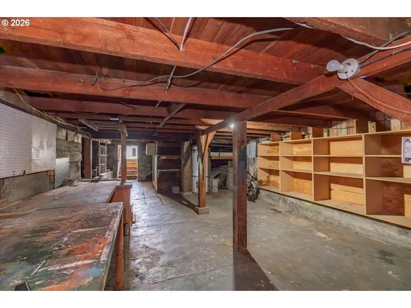 a view of a room with wooden walls