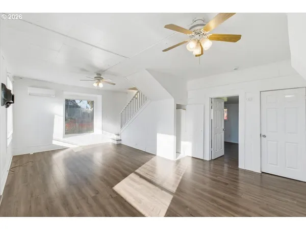 a view interior of a house wooden floor and an entryway