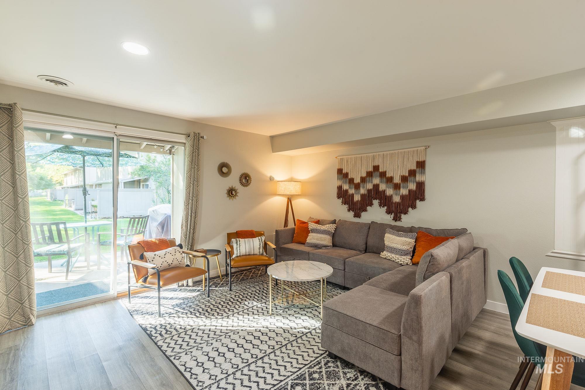 352 North Eagle Road Eagle, ID 83616 - Photo 2 of 44 Living room with wood finished floors and recessed lighting