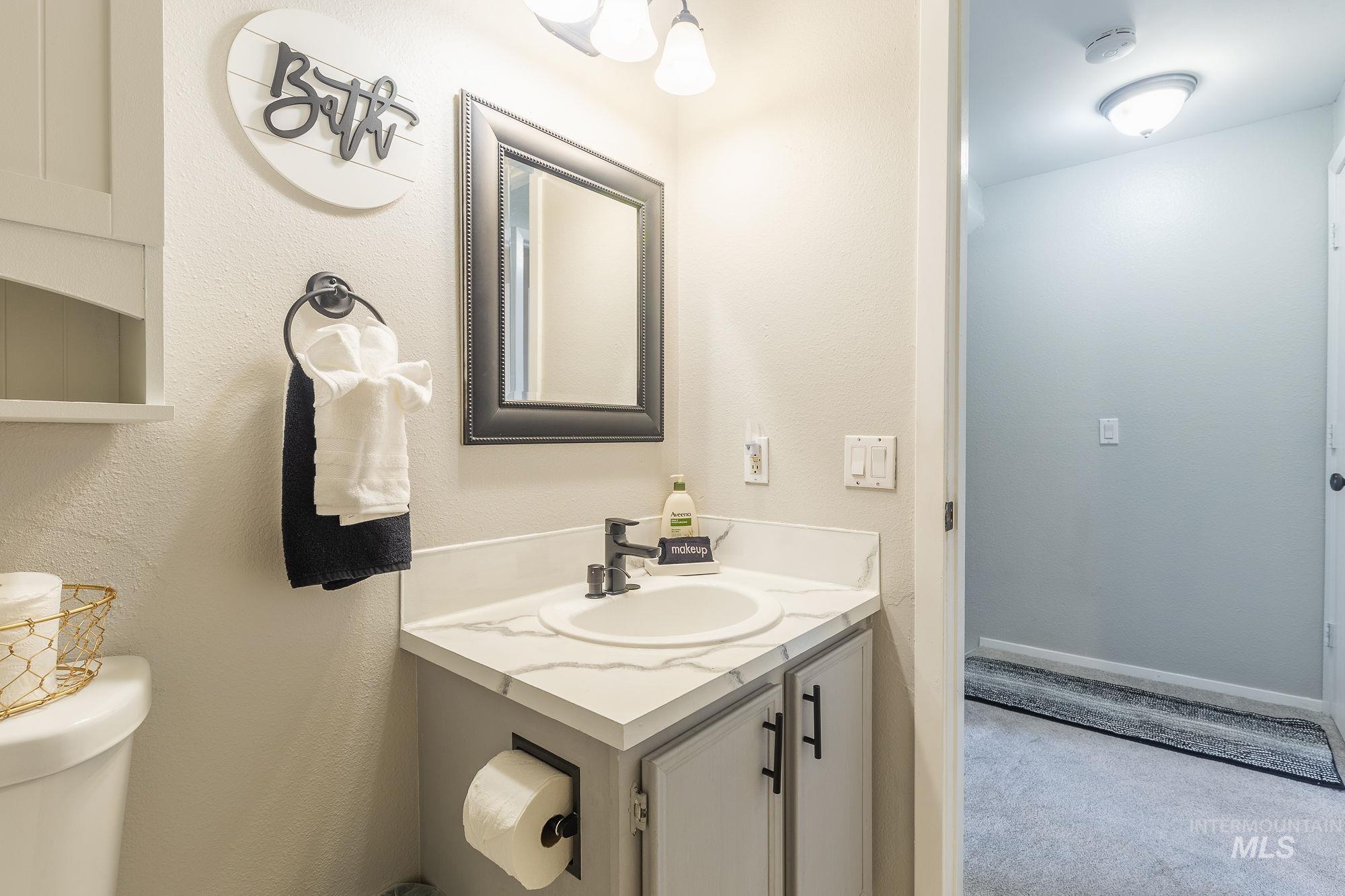 352 North Eagle Road Eagle, ID 83616 - Photo 30 of 44 Bathroom featuring toilet and vanity