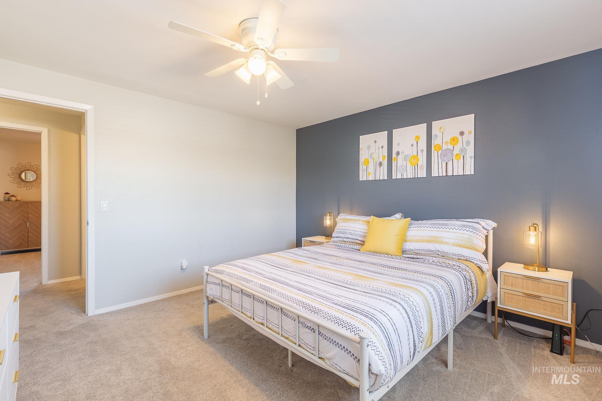 352 North Eagle Road Eagle, ID 83616 - Photo 33 of 44 Bedroom with carpet floors and ceiling fan