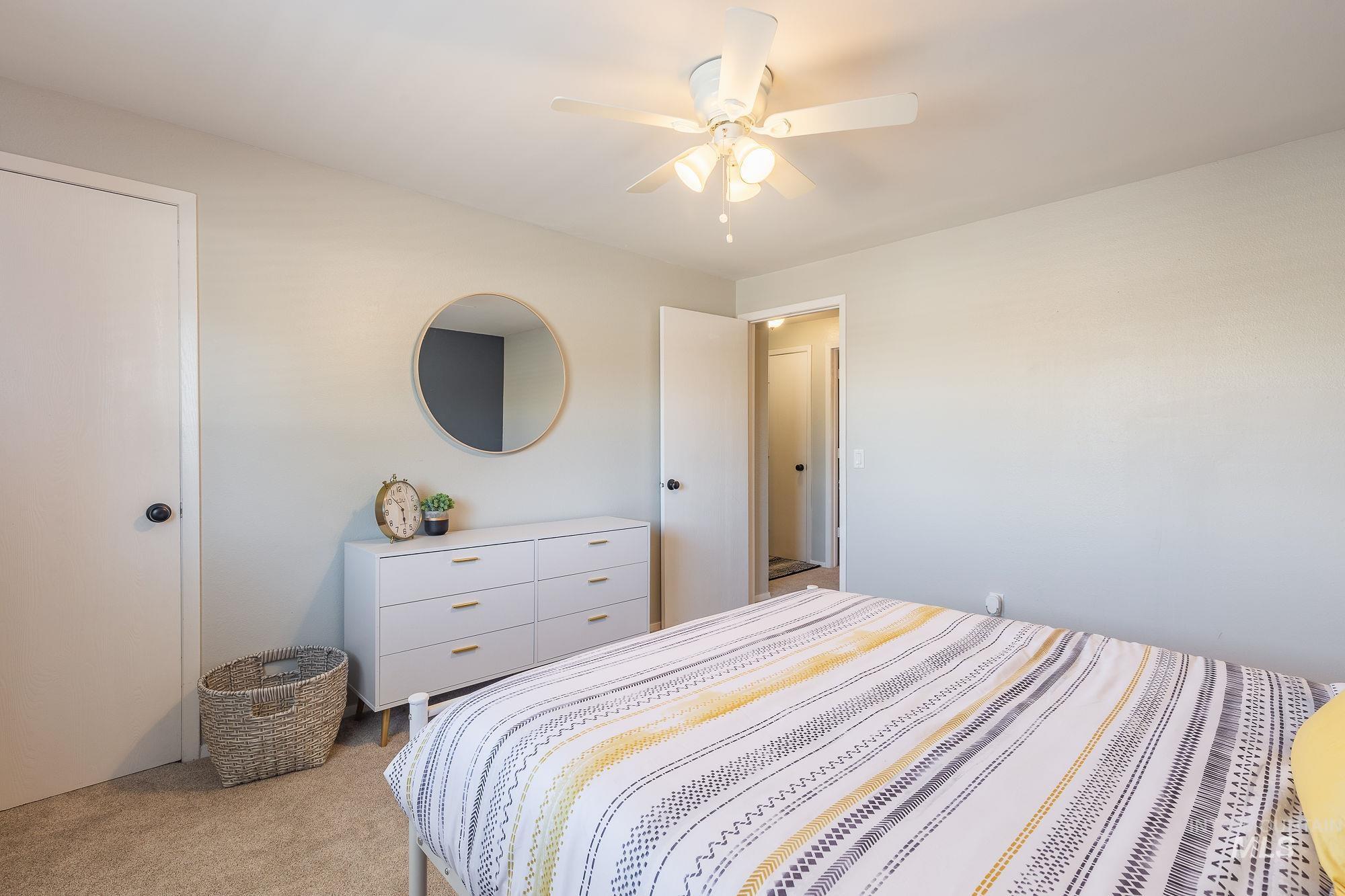 352 North Eagle Road Eagle, ID 83616 - Photo 34 of 44 Bedroom with light carpet and a ceiling fan
