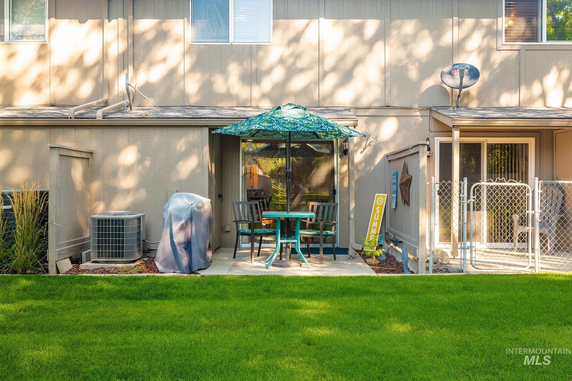 352 North Eagle Road Eagle, ID 83616 - Photo 40 of 44 Rear view of property with a lawn and a patio area