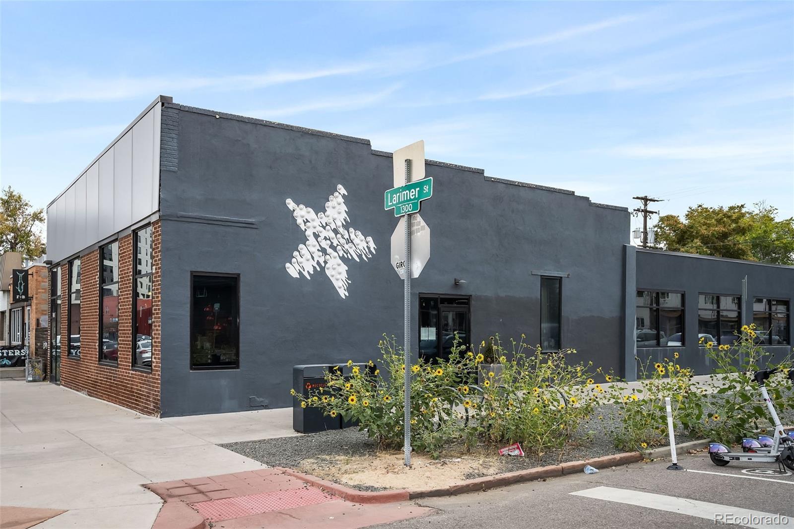 2500 Walnut Street, Unit 201 Denver, CO 80205 - Photo 27 of 30 a view of a house with brick walls and plants