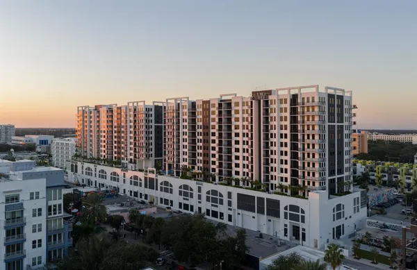 a view of a building with a city street