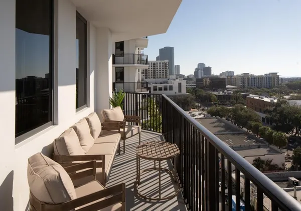 a balcony view with city view