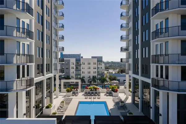 a view of city with tall buildings