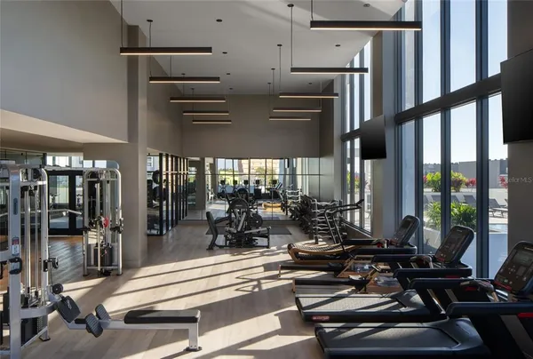 a room with lots of appliances and furniture