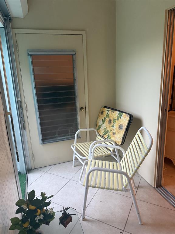 2050 Northeast 39th Street, Unit 211W Lighthouse Point, FL 33064 - Photo 21 of 30 a view of balcony with furniture