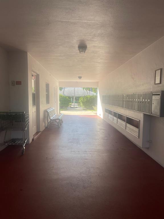 2050 Northeast 39th Street, Unit 211W Lighthouse Point, FL 33064 - Photo 27 of 30 an empty room with windows