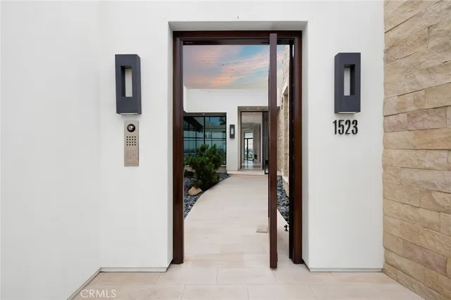 a view of a door and chair in front of a door