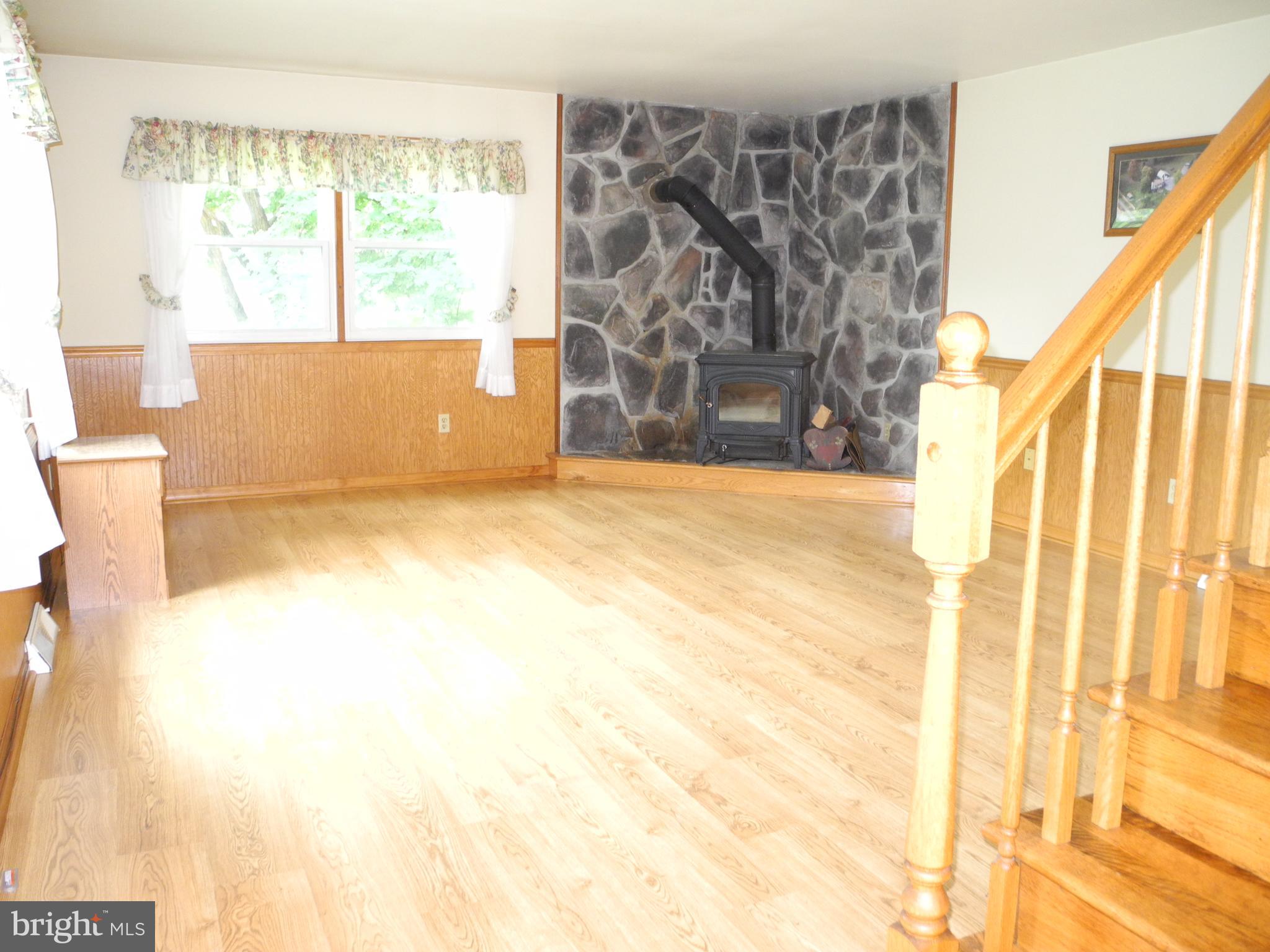 13204 Draper Road Clear Spring, MD 21722 - Photo 9 of 44 Living Room w/woodstove