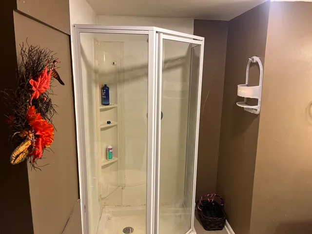 a bathroom with a sink vanity and a mirror