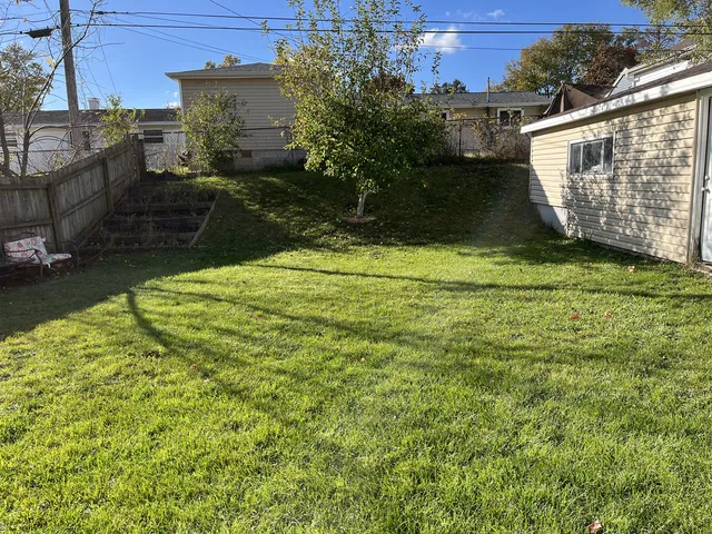 a view of a house with a garden