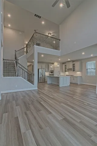 wooden floor and window in an empty room
