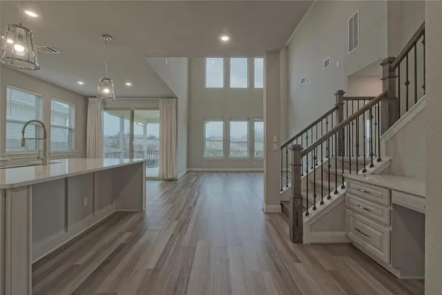 a view of entryway with wooden floor