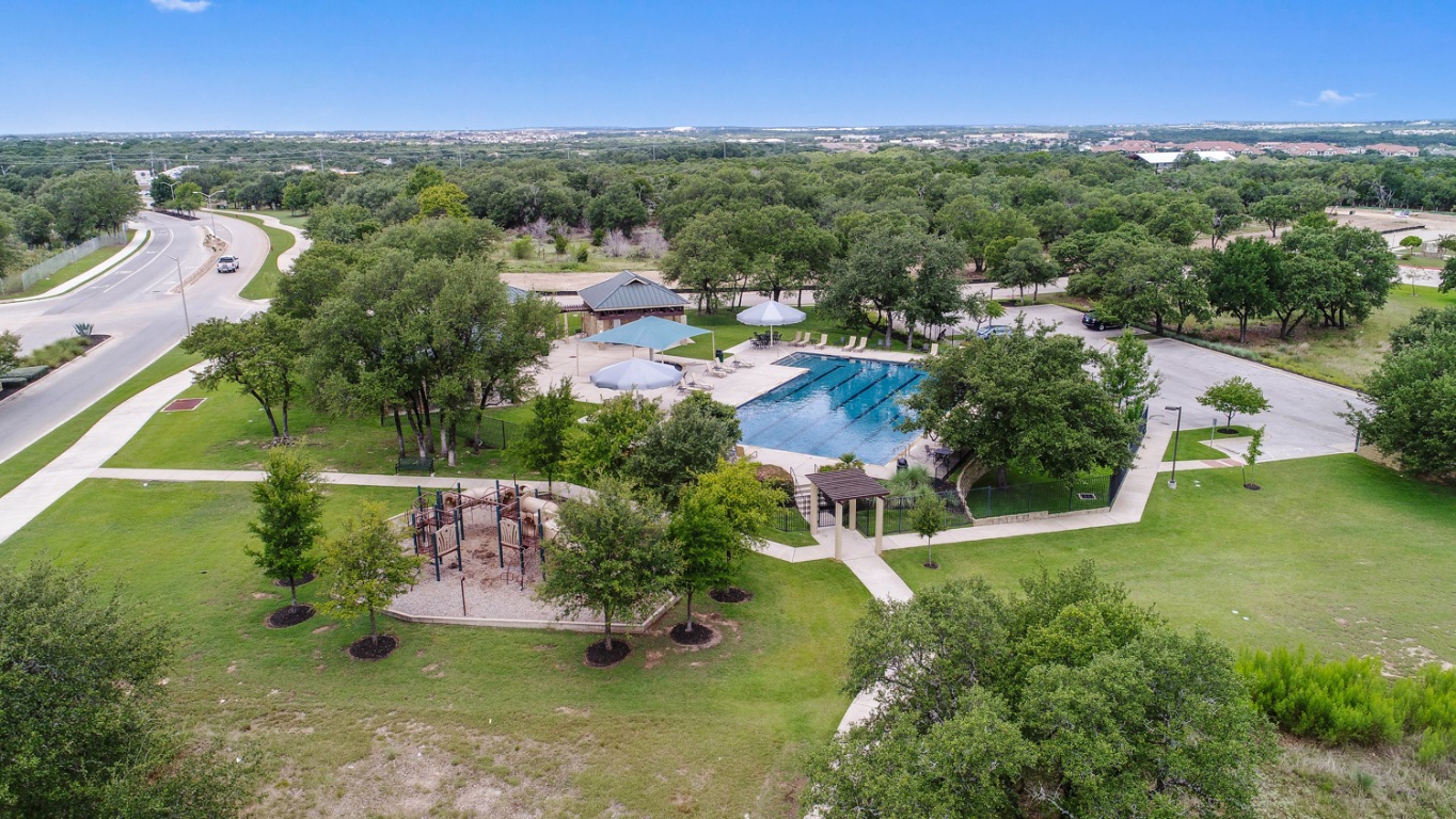 4020 Logan Ridge Drive Cedar Park, TX 78613 - Photo 37 of 40 Drone / aerial view of a pool area
