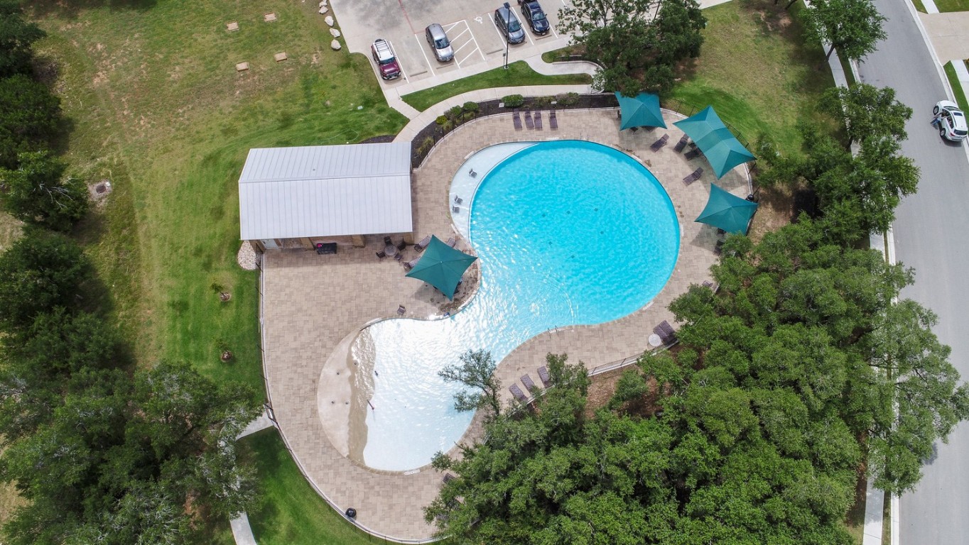 4020 Logan Ridge Drive Cedar Park, TX 78613 - Photo 39 of 40 Aerial view of property and surrounding area featuring a pool area