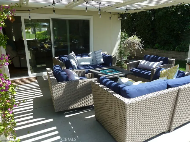 a outdoor living space with furniture and garden