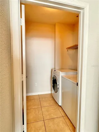 a bathroom with a washer and dryer