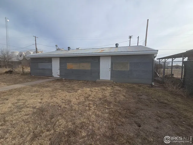 a view of a kitchen with a sink