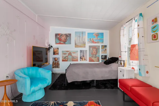 a living room with furniture and a window