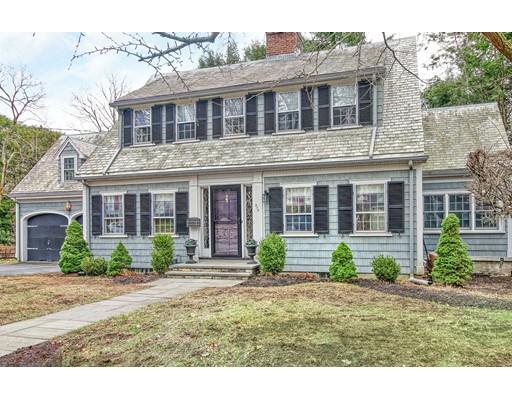 210 Varick Road Newton, MA 02468 - Photo 1 of 19 a front view of a house with garden and plants