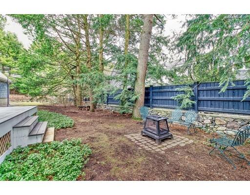 210 Varick Road Newton, MA 02468 - Photo 17 of 19 a view of a bench in the garden